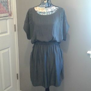 Silky grey dress with pockets and beading